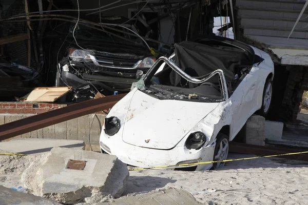 Destroyed luxury car in the aftermath of Hurricane Sandy in Far Rockaway, New York — Stock Photo, Image