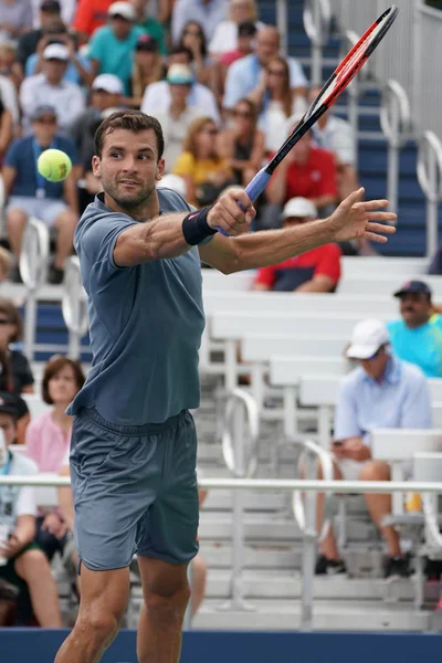 Professional tennis player Grigor Dimitrov of Bulgaria in action during his US Open 2017 second round match — Stock Photo, Image