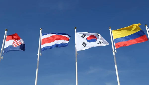 Międzynarodowych flagi: Chorwacja, Costa Rica, Republiki Korei i Kolumbia — Zdjęcie stockowe