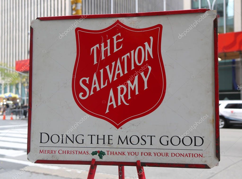 NEW YORK - NOVEMBER 16, 2017: Salvation Army red kettle for collections in midtown Manhattan. This Christian organization is known for its charity work, operating in 126 countries