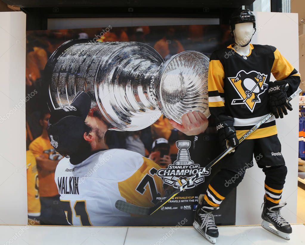 NEW YORK - NOVEMBER 16, 2017: The NHL shop decoration showing the Pittsburgh Penguins player with Stanley Cup in Midtown Manhattan.