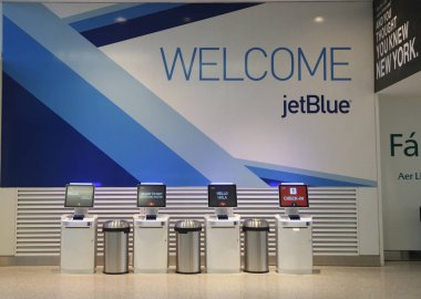 NEW YORK- DECEMBER 3, 2017: Inside of JetBlue Terminal 5 at John F Kennedy International Airport in New York clipart