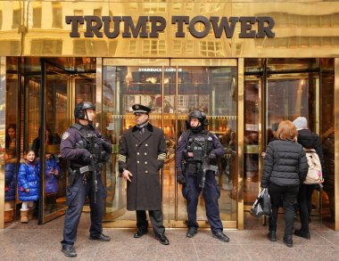 NEW YORK - DECEMBER 19, 2017: NYPD counter terrorism officers providing security at Trump Tower in midtown Manhattan during Holidays season in New York  clipart