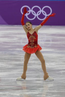 GANGNEUNG, SOUTH KOREA - FEBRUARY 12, 2018: Olympic champion Alina Zagitova of Olympic Athlete from Russia performs in the Team Event Ladies Single Skating Free Skating at the 2018 Winter Olympics clipart
