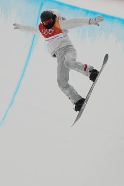 Pyeongchang, Güney Kore - 14 Şubat 2018: Olimpiyat Şampiyonu Shaun White erkekler snowboard halfpipe son Phoeinix kar Park 2018 Kış Olimpiyatları birlikte buz dansında yarışmaktadır