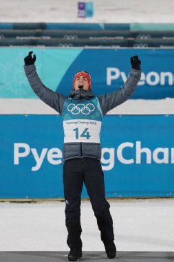 Pyeongchang, Güney Kore 18 Şubat 2018: Simon Schempp Almanya'nın 2018 Kış Olimpiyatları'nda biatlon erkekler 15 km toplu çıkış mekan şenlikte ikincisidir 