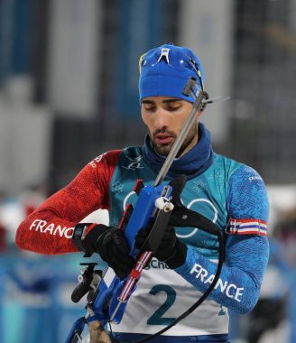 Pyeongchang, Güney Kore - 18 Şubat 2018: Olimpiyat şampiyonu Fransa'nın Martin Fourcade Alpensia Biatlon merkezinde 2018 Kış Olimpiyatları'nda biatlon erkekler 15 km toplu çıkış içinde rekabet