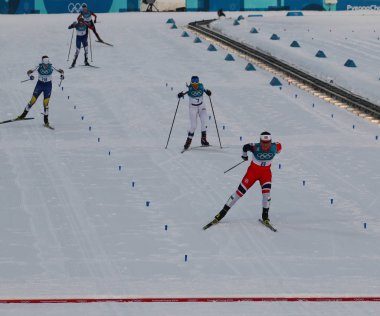 Pyeongchang, Güney Kore - 10 Şubat 2018: tarihteki en dekore edilmiş kış Olympian kitle Norveç Marit Bjoergen başlatmak bayanlar 7.5 km + 7.5 km Skiathlon 2018 Kış Olimpiyatları