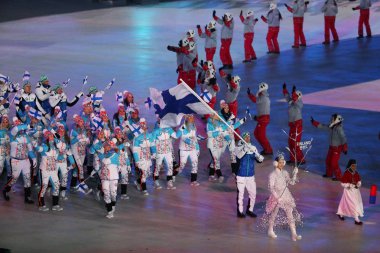 Pyeongchang, Güney Kore - 9 Şubat 2018: Janne Finlandiya bayrağı taşıyan açılış töreni Pyeongchang 2018 Kış Olimpiyat Oyunları'Fin Olimpiyat takım lider Ahonyen