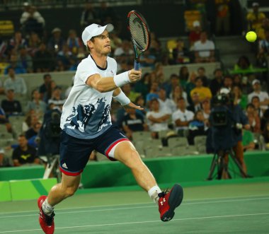 RIO DE JANEIRO, BRAZIL - AUGUST 14, 2016: Olympic champion Andy Murray of Great Britain in action during men's singles final match of the Rio 2016 Olympic Games at the Olympic Tennis Centre clipart