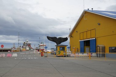 PUNTA ARENAS, CHILE - JANUARY 31, 2020: Sea port of Punta Arenas, Chile. This Chilean city is considered as a gateway to Antarctica. Punta Arenas located on the Strait of Magellan