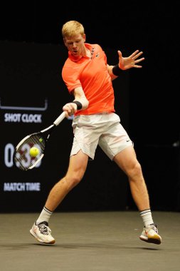 UNIONDALE, NEW YORK - FEBRUARY 16, 2020:  2020 New York Open tennis tournament Champion Kyle Edmund of Great Britain in action during his final match in Uniondale, New York