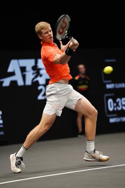 UNIONDALE, NEW YORK - FEBRUARY 16, 2020:  2020 New York Open tennis tournament Champion Kyle Edmund of Great Britain in action during his final match in Uniondale, New York