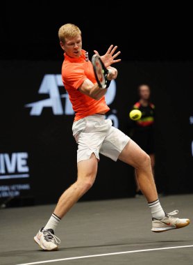 UNIONDALE, NEW YORK - FEBRUARY 16, 2020:  2020 New York Open tennis tournament Champion Kyle Edmund of Great Britain in action during his final match in Uniondale, New York