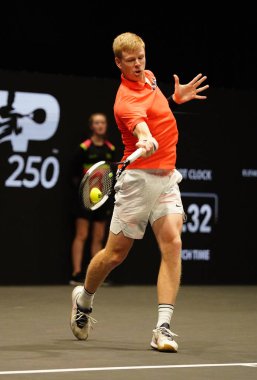 UNIONDALE, NEW YORK - FEBRUARY 16, 2020:  2020 New York Open tennis tournament Champion Kyle Edmund of Great Britain in action during his final match in Uniondale, New York