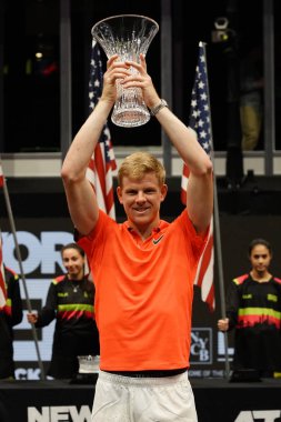 UNIONDALE, NEW YORK - FEBRUARY 16, 2020:  2020 New York Open tennis tournament Champion Kyle Edmund of Great Britain during trophy presentation after his final match victory  in Uniondale, New York