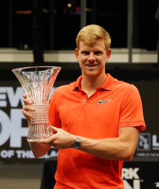UNIONDALE, NEW YORK - FEBRUARY 16, 2020:  2020 New York Open tennis tournament Champion Kyle Edmund of Great Britain during trophy presentation after his final match victory  in Uniondale, New York