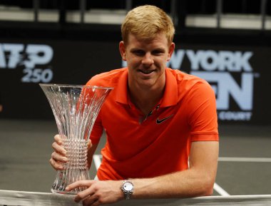 UNIONDALE, NEW YORK - FEBRUARY 16, 2020:  2020 New York Open tennis tournament Champion Kyle Edmund of Great Britain during trophy presentation after his final match victory  in Uniondale, New York