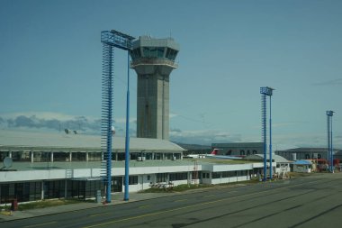PUNTA ARENAS, CHILE - JANUARY 30, 2020: Terminal and Air Traffic Control Tower at Presidente Carlos Ibanez del Campo International Airport in Punta Arenas, Chile