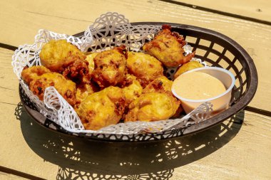 Traditional Bahamian conch fritters clipart