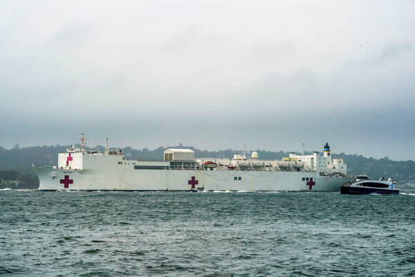 NEW YORK - APRIL 30, 2020:  The USNS Comfort Hospital Ship departing New York City after a month of caring for patients with the Coronavirus