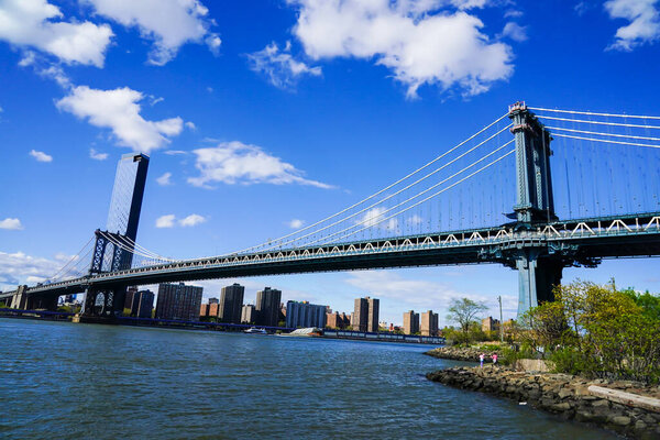 NEW YORK - MAY 4, 2020: Famous Manhattan Bridge.The Manhattan Bridge is a suspension bridge that crosses the East River, it was opened on December 31, 1909 and was designed by Leon Moisseiff