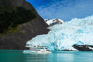 EL CALAFATE, ARGENTINA - FEBRUARY, 8, 2020: Lake Argentino cruise to see the Spegazzini and Upsala Glaciers in Argentinian Patagonia clipart