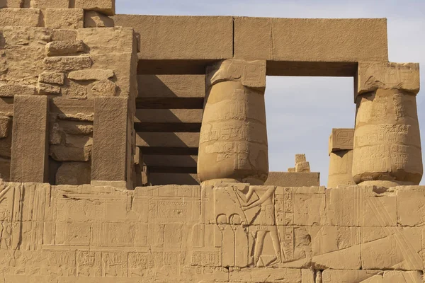 Luxor Governorate, Egypt, Karnak Temple, complex of Amun-Re. Embossed hieroglyphics on columns and walls. The third pylon.