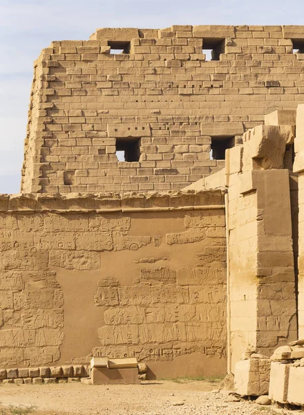 Luxor Governorate, Egypt, Karnak Temple, complex of Amun-Re. Embossed hieroglyphics on columns and walls.