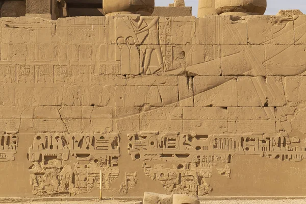 Luxor Governorate, Egypt, Karnak Temple, complex of Amun-Re. Embossed hieroglyphics on columns and walls. The third pylon.