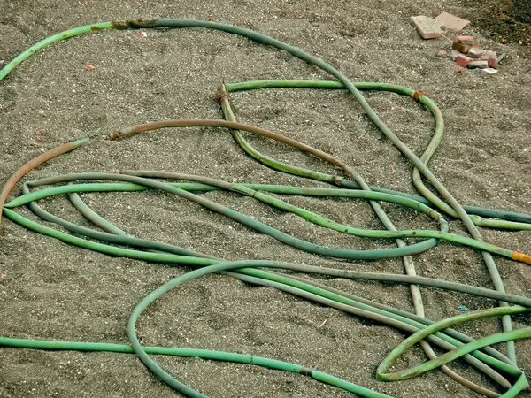 Tubo Borracha Mantido Perto Local Construção Construção — Fotografia de Stock