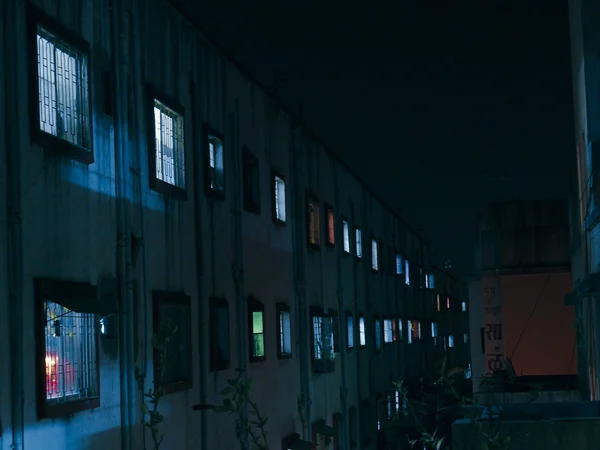 Perspective view of a Building with windows at night, Pune, Maharashtra, India