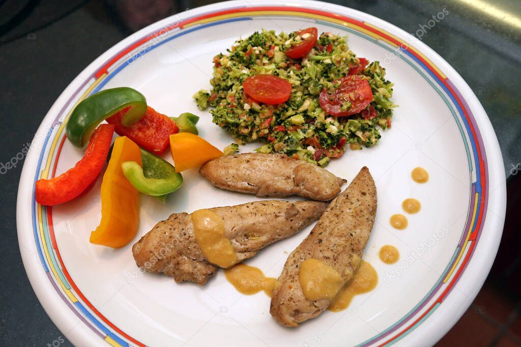 Chicken meat with broccoli salad