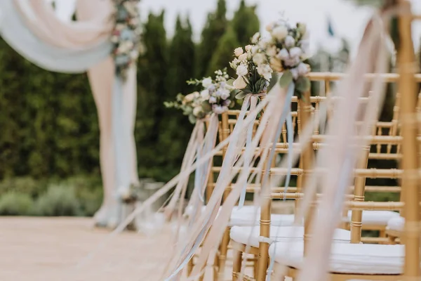 Decorated bouquet of the bride in a chair — Stock Photo, Image