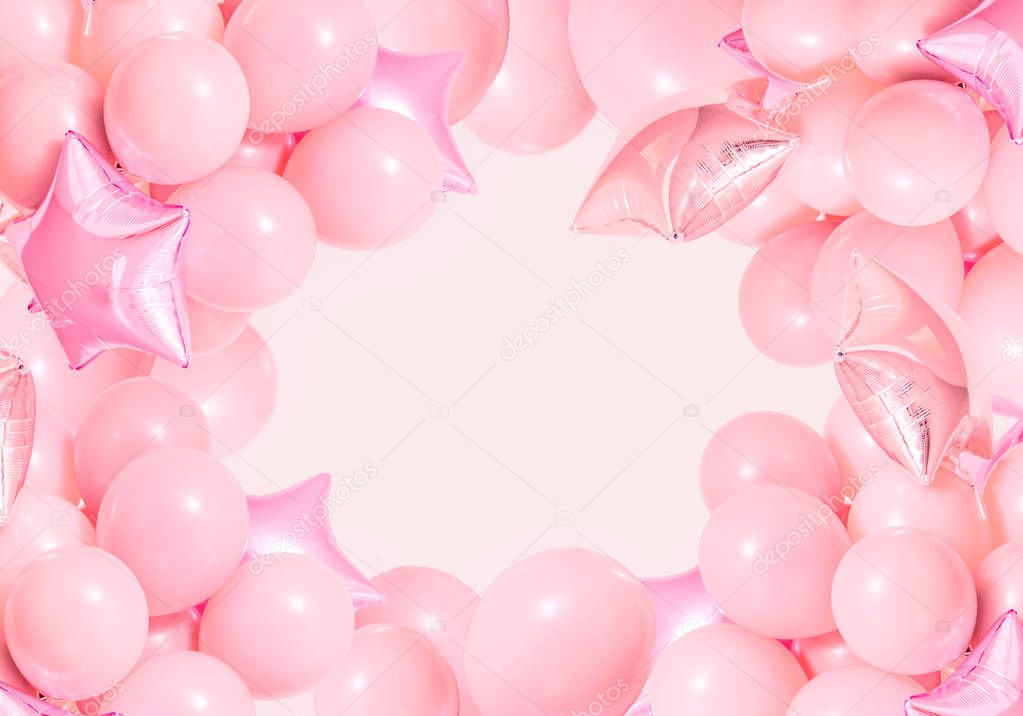 Pink birthday air balloons on mint background 