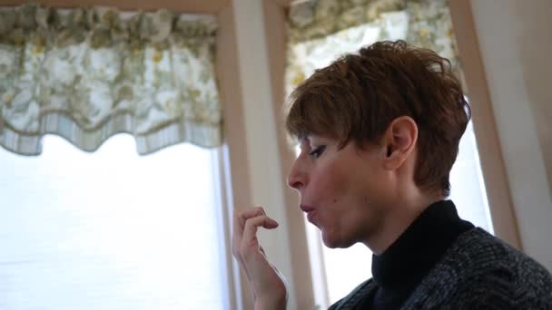 Middle Aged Woman Blowing Dry Her Fingernail Polish — Stock Video