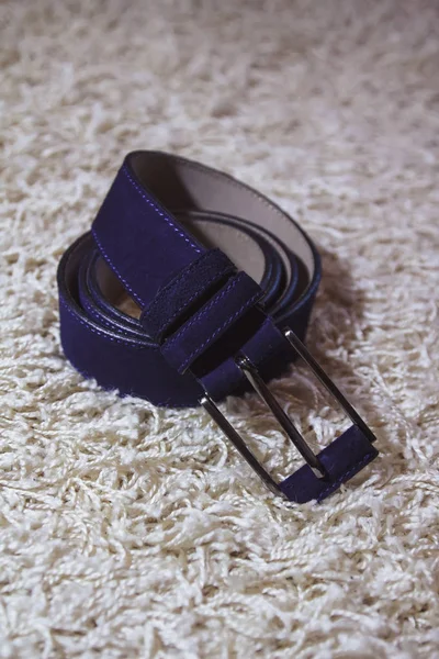 Wedding men's belt lying on the floor — Stock Photo, Image