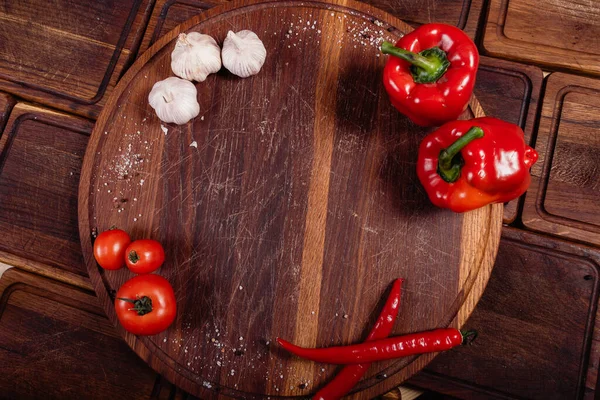 Italian decorated table with Italian flag, vegetables and wooden rustic board