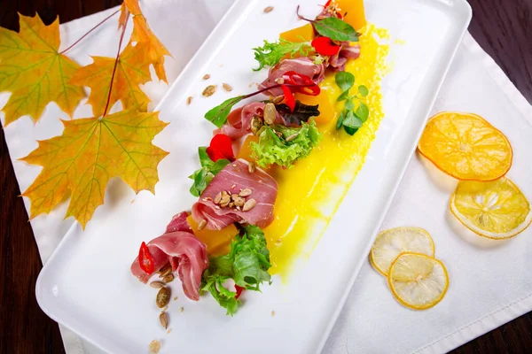 Pumpkin Gravy Salad Spanish Jamon Pepper Herbs White Plate Decorated — Stock Photo, Image