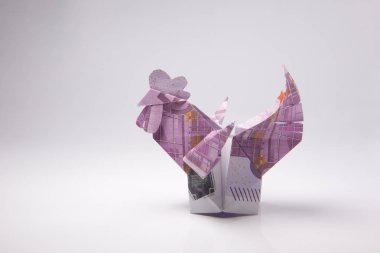 Origami bir horoz şeklinde