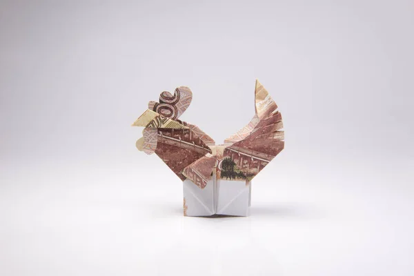 Origami in de vorm van een haan — Stockfoto