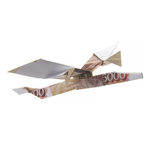 Avião de origami a partir de notas — Fotografia de Stock