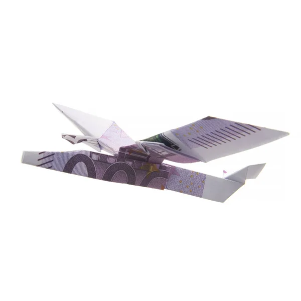 Avião de origami a partir de notas — Fotografia de Stock