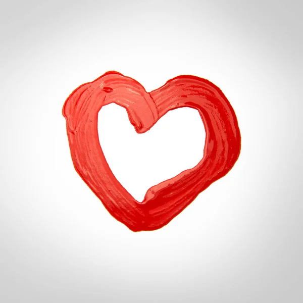Maalattu punainen sydän — kuvapankkivalokuva