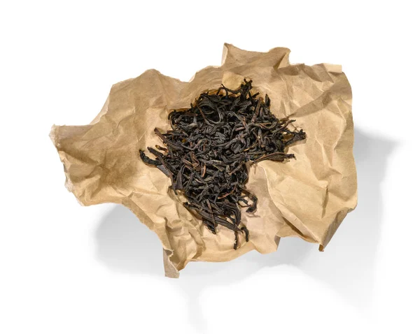 Vista superior del té negro sobre fondo blanco — Foto de Stock