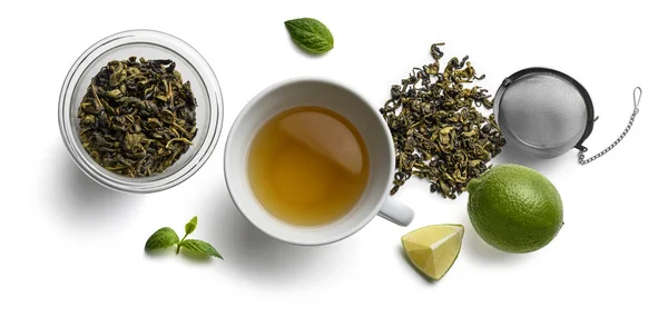 Green tea and accessories top view on white background — Stock Photo, Image