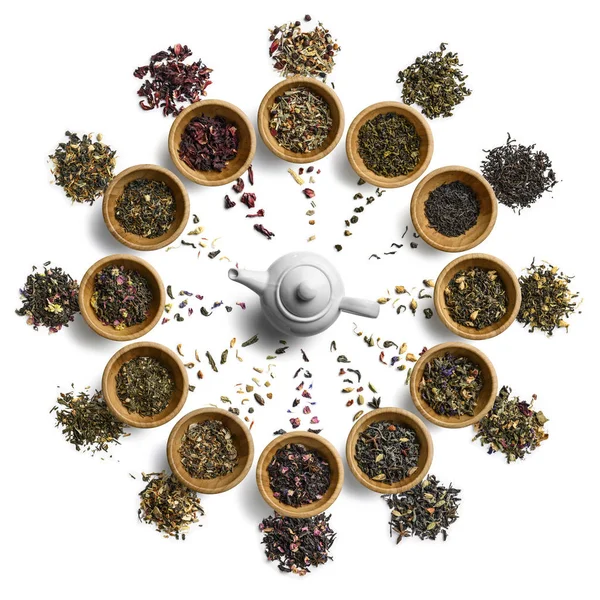 Gran juego de té en la forma de una esfera de reloj. Vista superior sobre fondo blanco —  Fotos de Stock
