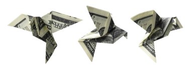 Hundred dollar bills in the shape of birds in flight on a white background
