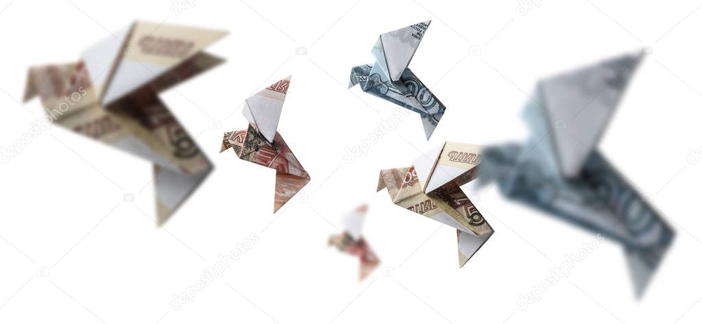 Russian rubles in the form of birds. Flying on a white background
