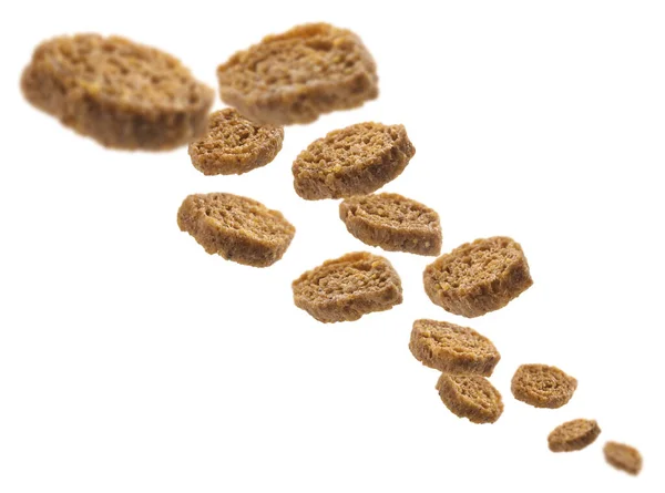 Bread croutons levitate on a white background — Stock Photo, Image